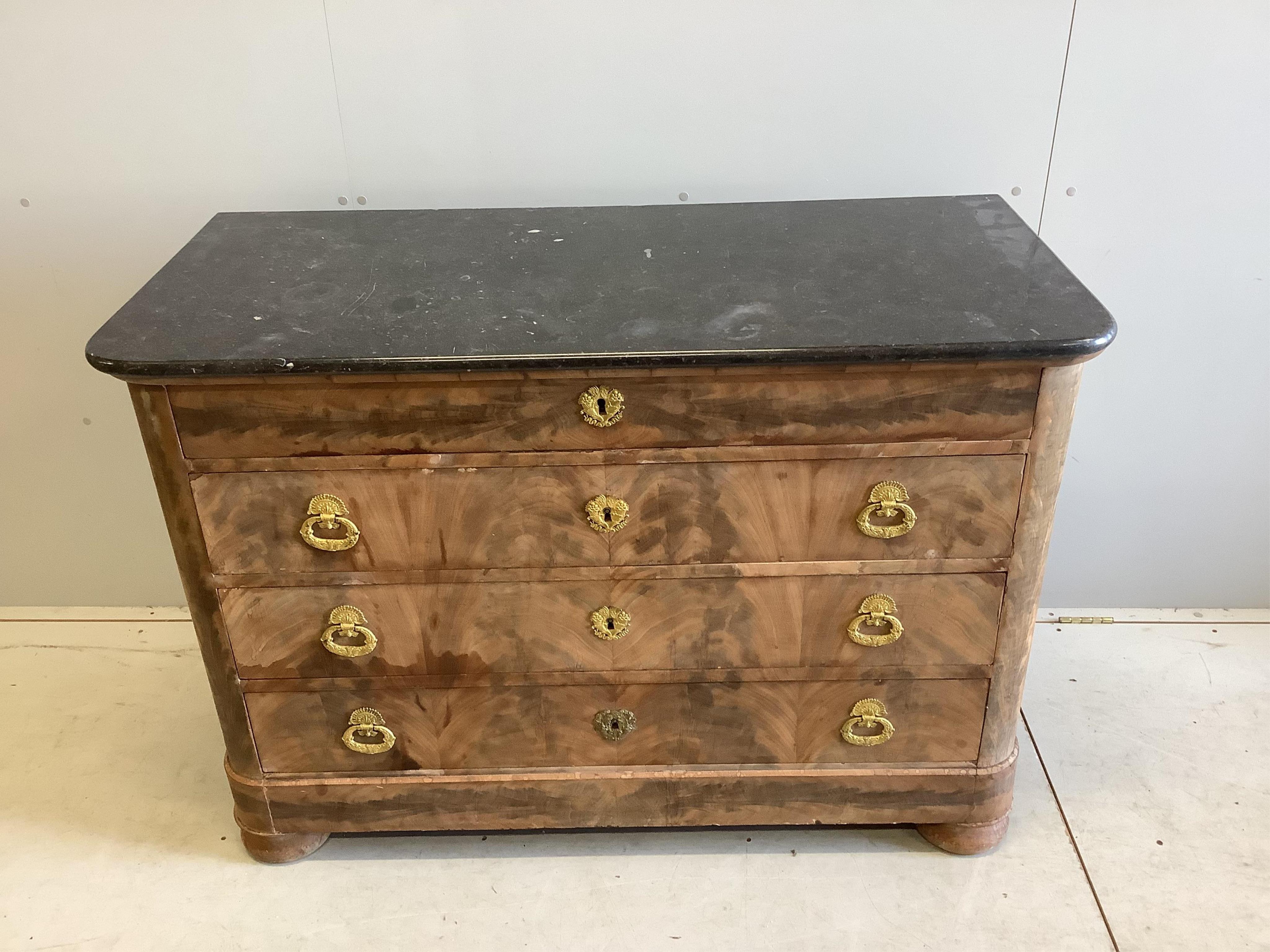 A 19th century French faded mahogany marble topped four drawer commode, width 130cm, depth 59cm, height 92cm. Condition - fair